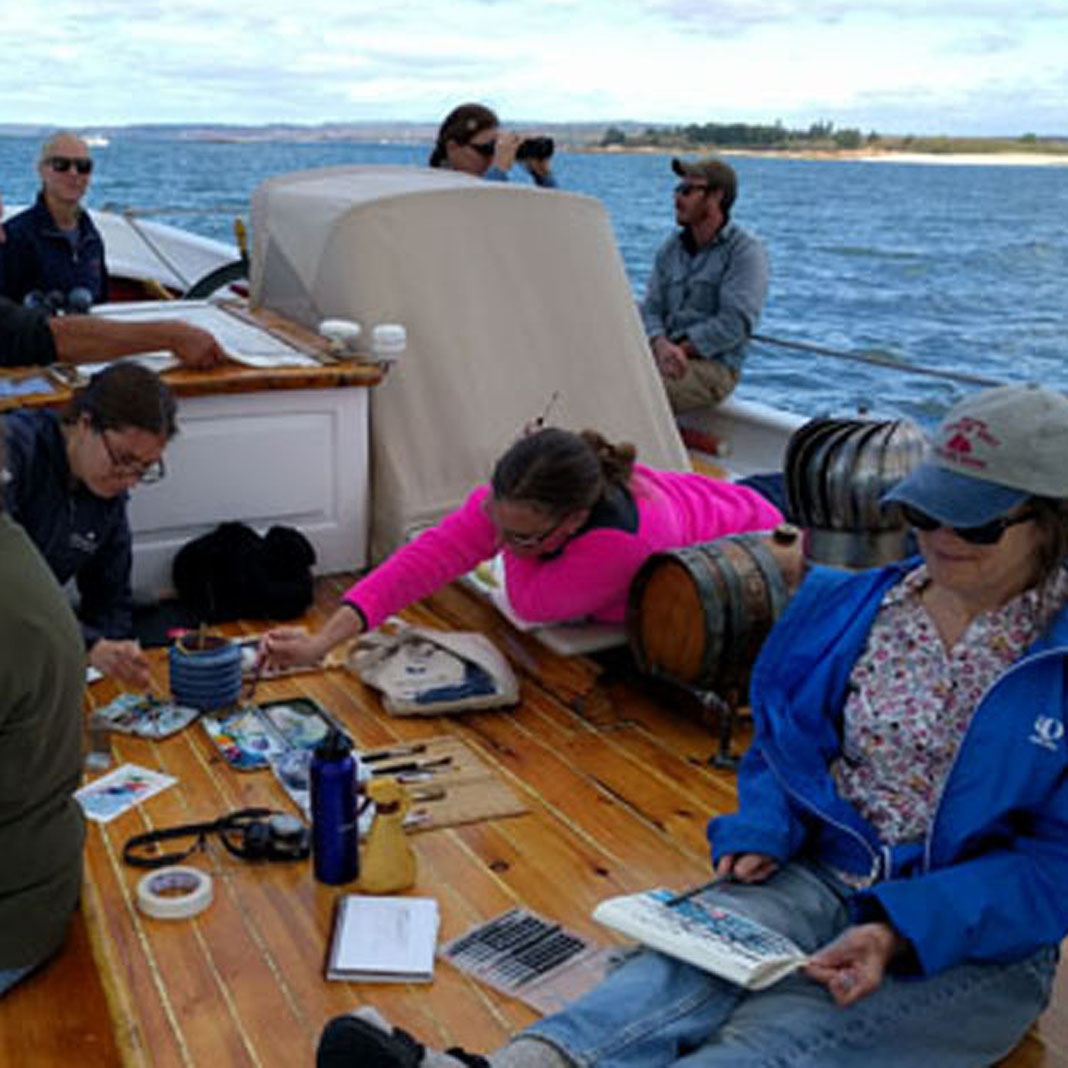 Painting aboard schooner American Eagle.